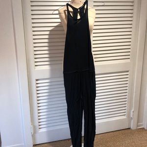 Polo jumpsuit with tie waist.